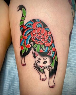 Monmon cat tattoo by Mike Horman